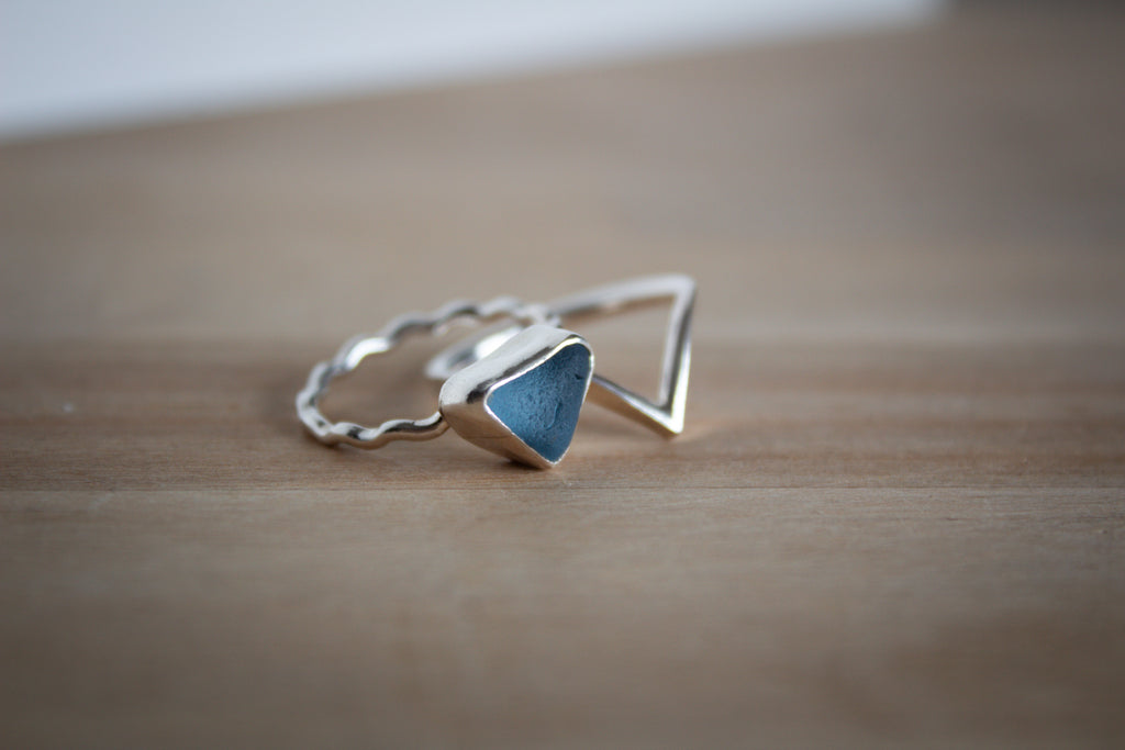 Stack of 2 silver rings with blue sea glass
