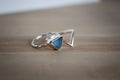 Stack of 2 silver rings with blue sea glass