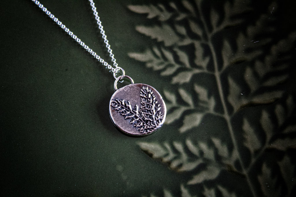 Botanical impression silver fern charm
